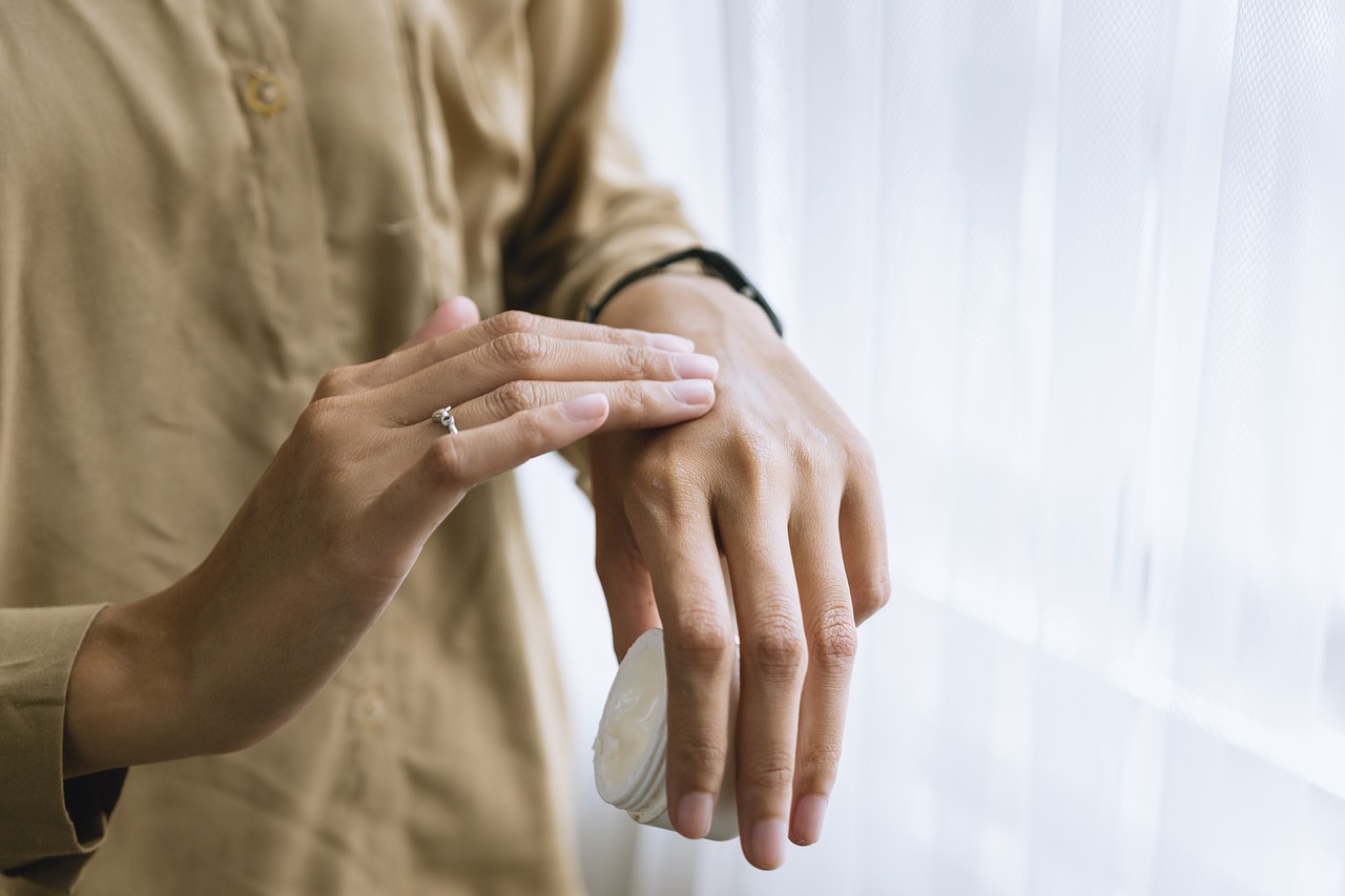 a person touching their hand