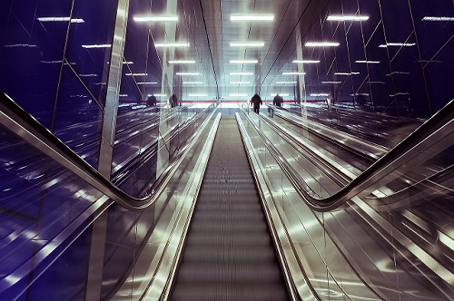 mirrored wall escalator