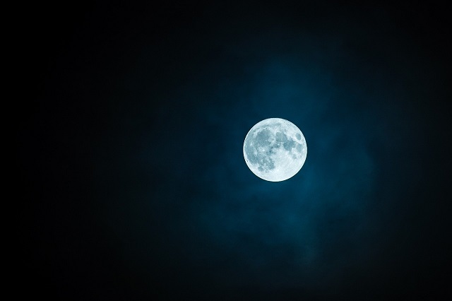 image of the moon on a black night